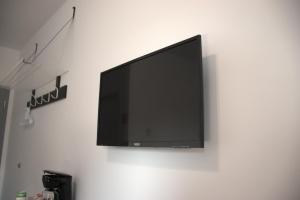 TV a/nebo společenská místnost v ubytování Motel M