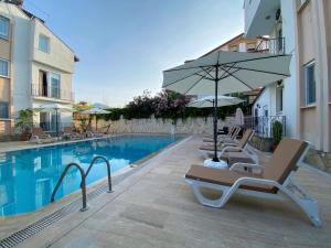 Bazén v ubytování Cam Hotel nebo v jeho okolí
