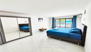 Postel nebo postele na pokoji v ubytování Blue Lagoon Villa