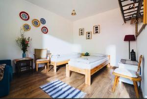 Postel nebo postele na pokoji v ubytování Apartamenty Cichy Kącik