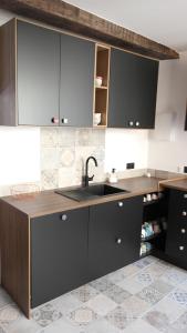 Η κουζίνα ή μικρή κουζίνα στο Et Pop Et Chic, la maison !