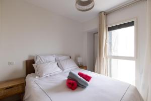 Postel nebo postele na pokoji v ubytování La perle Marine