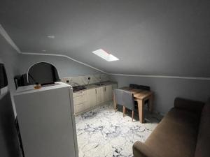 Kuchyň nebo kuchyňský kout v ubytování adora apart
