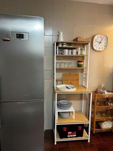 Kuchyň nebo kuchyňský kout v ubytování Acogedor y Amplio Apartamento familiar a pie de playa