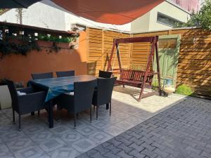 A patio or other outdoor area at Diva Garden Apartment