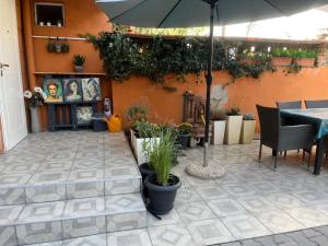 A patio or other outdoor area at Diva Garden Apartment