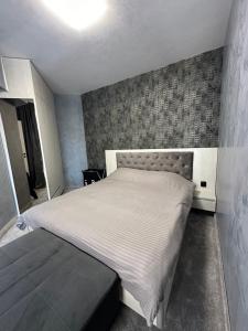 Postel nebo postele na pokoji v ubytování Complex Yavor