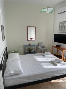 Postel nebo postele na pokoji v ubytování Apartment of Zeus III-Leptokarya