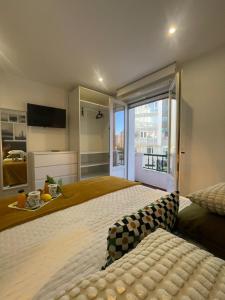 En eller flere senge i et værelse på YBH Villa Valentina - Apartamentos Turísticos