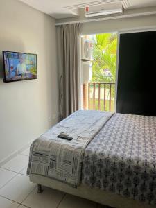 Postel nebo postele na pokoji v ubytování Apartamento Completo no Beach Living Porto das Dunas - Apto Luxo