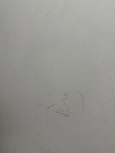 a white wall with a painting on it at guest house panorama GJirokaster in Gjirokastër