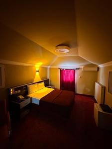 Postel nebo postele na pokoji v ubytování Minabir Otel
