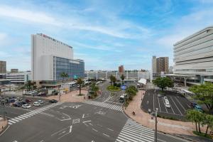 an aerial view of a street in a city at JR Kyushu Hotel Miyazaki in Miyazaki +64 photos