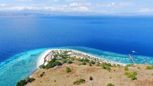 an aerial view of an island in the ocean at Le Pirate Island - Adults Only in Labuan Bajo