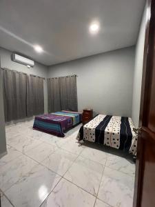 En eller flere senge i et værelse på Villa Florencia Costa del Sol