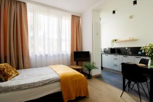 Posteľ alebo postele v izbe v ubytovaní PiotrApartments - Big City Life Apartments in Central Warszawa