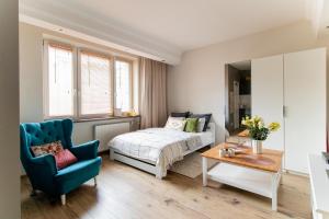 Posteľ alebo postele v izbe v ubytovaní PiotrApartments - Big City Life Apartments in Central Warszawa