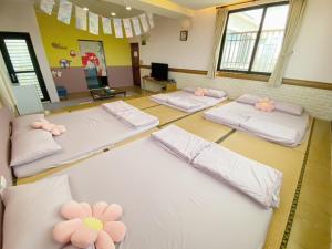 Letto o letti in una camera di Big Fish Homestay
