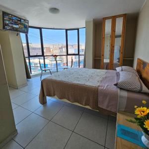 Ένα ή περισσότερα κρεβάτια σε δωμάτιο στο Hotel Santa Bárbara