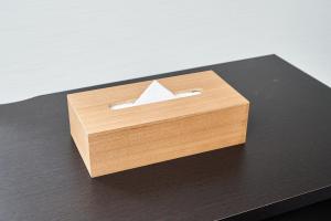 a wooden box with a white paper sticking out of it at Rikyuan Kyoto Nishikyogoku in Kyoto