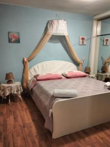 Posteľ alebo postele v izbe v ubytovaní ControVento Apartament II