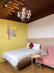 Letto o letti in una camera di Big Fish Homestay