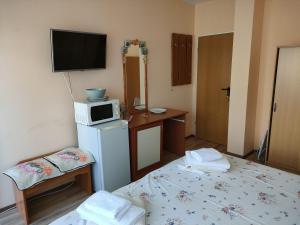 Postel nebo postele na pokoji v ubytování Самостоятелни стаи Виктория