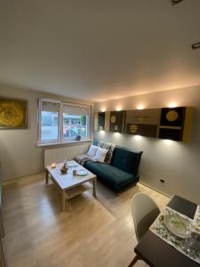 Posezení v ubytování Omega Apartment