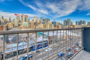 a view of a city from a balcony at A Spacious Downtown 1-bed Suite in Calgary