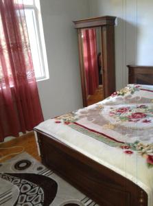 a bedroom with a bed with a glass display at House Anna in Gonio