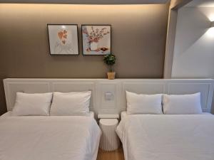 Postel nebo postele na pokoji v ubytování The solid residence - Elbon the stay by haeundae