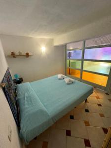 Ένα ή περισσότερα κρεβάτια σε δωμάτιο στο Nel Cuore della Costa Smeralda