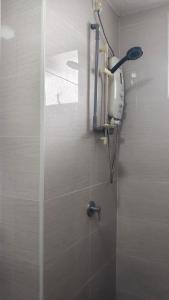 a shower in a bathroom with a shower at SAFIYA Homestay Vista Alam in Shah Alam