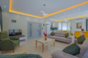 Μια τηλεόραση ή/και κέντρο ψυχαγωγίας στο Infinity Olive Villa