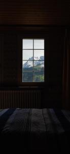 Ένα ή περισσότερα κρεβάτια σε δωμάτιο στο Gasthaus Stausee