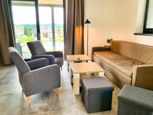Posezení v ubytování Apartmánové domy Lipno 1