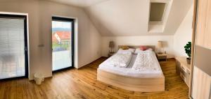 Postel nebo postele na pokoji v ubytování Apartmánové domy Lipno 1