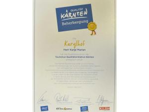 Certificato, attestato, insegna o altro documento esposto da 1 at Lake Faak - Karglhof - South view