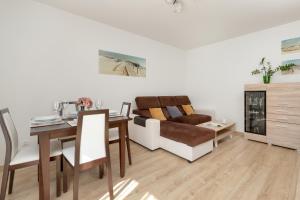 Kuchyň nebo kuchyňský kout v ubytování Jasny Apartament w Gdyni z Parkingiem by Rent like home