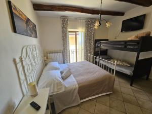 Postel nebo postele na pokoji v ubytování Patrizia Casa Vacanze + 37 fotografií