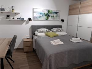 Postel nebo postele na pokoji v ubytování Vila Petra with sea view + 37 fotografií
