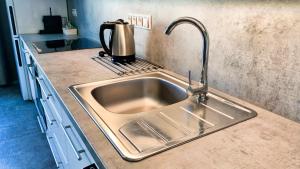 Kuchyň nebo kuchyňský kout v ubytování Apartmánové domy Lipno 1
