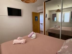 Postel nebo postele na pokoji v ubytování Villa pour 4 personnes proche Santa Giulia