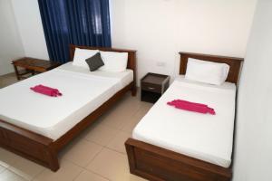 Lova arba lovos apgyvendinimo įstaigoje Pub Ceylon Hostel