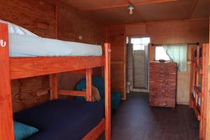 Palanda nebo palandy na pokoji v ubytování Open Gate Hostel Hawaii