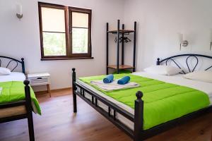 Postel nebo postele na pokoji v ubytování Бунгала - Камчия - Електрон Универс