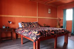 Postel nebo postele na pokoji v ubytování Open Gate Hostel Hawaii