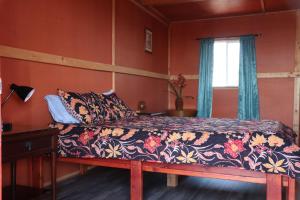 Postel nebo postele na pokoji v ubytování Open Gate Hostel Hawaii