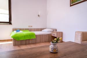 Postel nebo postele na pokoji v ubytování Бунгала - Камчия - Електрон Универс