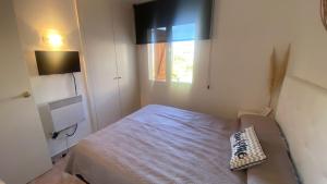 Posteľ alebo postele v izbe v ubytovaní Apartament a Sant Antoni de Calonge